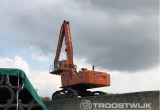 Online Auction of Two Transshipment Cranes 4