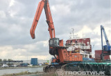 Online Auction of Two Transshipment Cranes 5