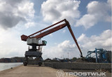 Online Auction of Two Transshipment Cranes 2