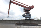 Online Auction of Two Transshipment Cranes 6