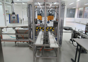 Merz KT160 semi-automatic packing line for packing sticks into pre-folded cartons