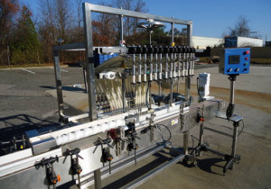 Sistemas de enchimento em linha Máquina de enchimento de líquido de transbordamento automático de 14 bicos, totalmente inoxidável