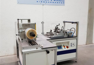 OVERWRAPPING MACHINE