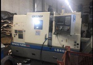 Used OKUMA LB 400 M machining center