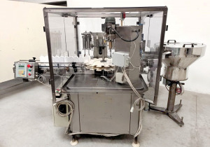 COMAS  MOD. RF1000 - Liquid filling and capping machine used