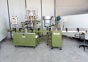 STEROMECCANICA - Liquid filling and capping machine used