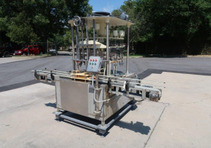 Used Packaging Dynamics 16 Spout Rotary Pressure Gravity Filling Machine, 8-1/2 In. Centers