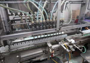 Máquina automática de enchimento de pistão de 14 cabeças National Instrument Filamatic, pistões de 280 Cc