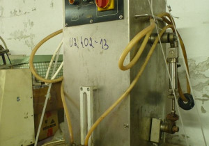 Llenadora de líquidos Empak semiautomática de dos pistones usada modelo Dp2E