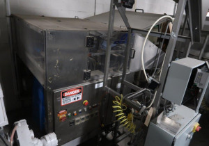 Machine à fabriquer et insérer des sacs en polyéthylène Ok Corp. d'occasion