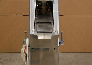 King tablet feeder with screening and dust collection
