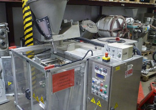 Máquina de embalagem de pó vertical usada em sachês por Schmucker Srl Tipo As200