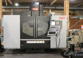 USED Toyoda FV1165 Vertical Machining Center, Cat 50, 6,000 RPM, New 2012 WITH 4th Axis Rotary