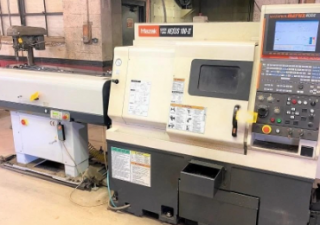 USED Mazak QTN-100-2 with barfeeder, chip conveyor, tailstock and parts catcher