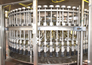 Llenadora de botellas por gravedad a presión rotativa de 72 válvulas Us Bottlers