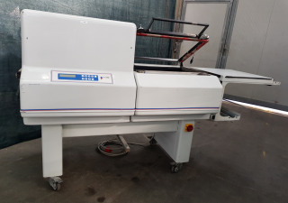 ROBOPAC - L bar sealer and shrink tunnel used