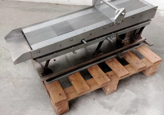 Vibratory feeder for tablets used