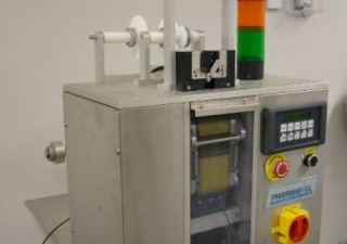 used Pharmafill Desiccant Inserter model PS-1