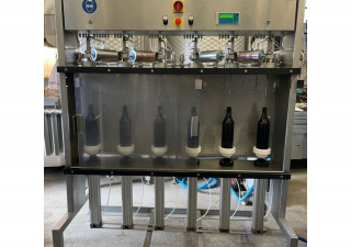 Used Semi-automatic bottle filling machine for beer
