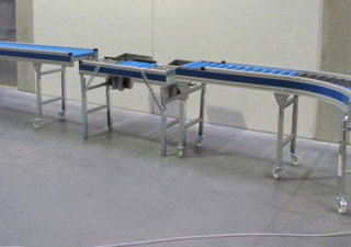 Used ROLLER CONVEYOR WITH PACKING TABLE