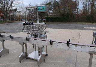 Used Inline Filling Systems 4 Spout Overflow Straight Line Liquid Filler, Stainless Steel