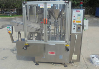 Machine de remplissage et de scellage automatique de tubes en plastique à air chaud Tgm d'occasion
